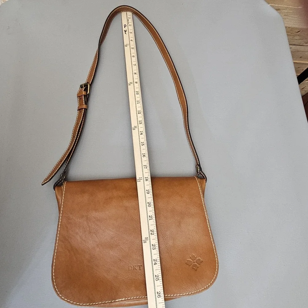 Patricia Nash Positano Saddle Bag Brown Leather Monogrammed‎ Handbag Purse